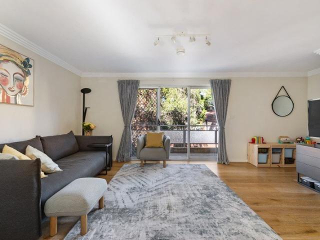 Generous c1983 townhouse with deep backyard