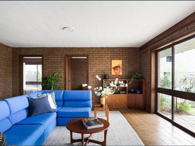 Generous Family Home with Established Gardens and Golf Course Backdrop