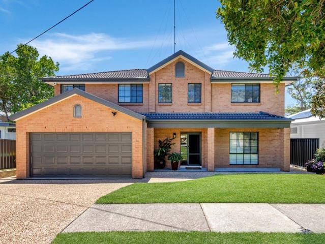 GENEROUS FAMILY LIVING WITH MULTIPLE ENTERTAINING ZONES