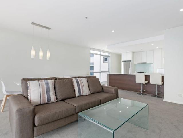 GENEROUS FULLY FURNISHED TOP FLOOR TWO BEDROOM WITH PANORAMIC WATER VIEWS