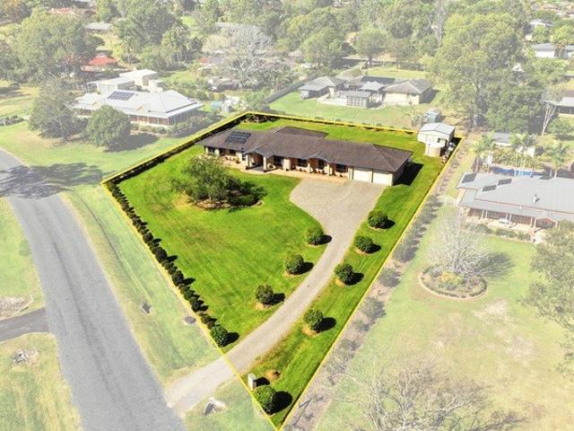 GENEROUS LOW SET BRICK HOME
