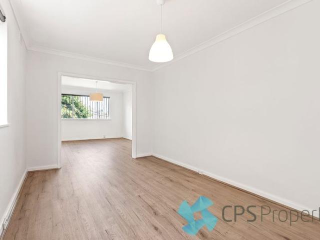 GENEROUS NORTH FACING FOUR BEDROOM HOME IN HIGHLY SOUGHT AFTER LOCATION