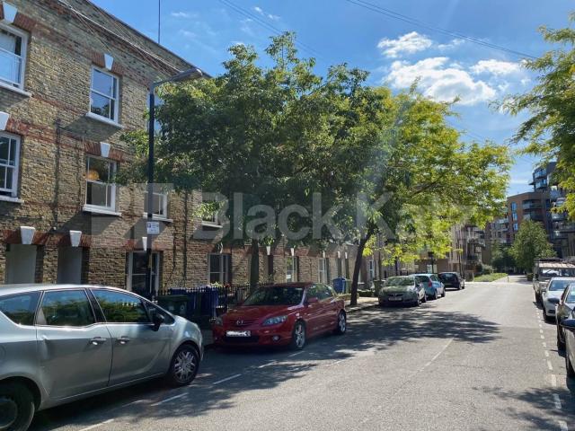Georgian house,two bathrooms, charming patio garden & highly desirable address