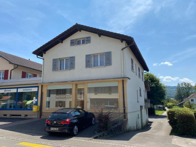 Gebäude mit 2 Wohnungen und einem Geschäftslokal