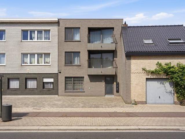 Gelijkvloers 2 slaapkamerappartement met terras en tuintje