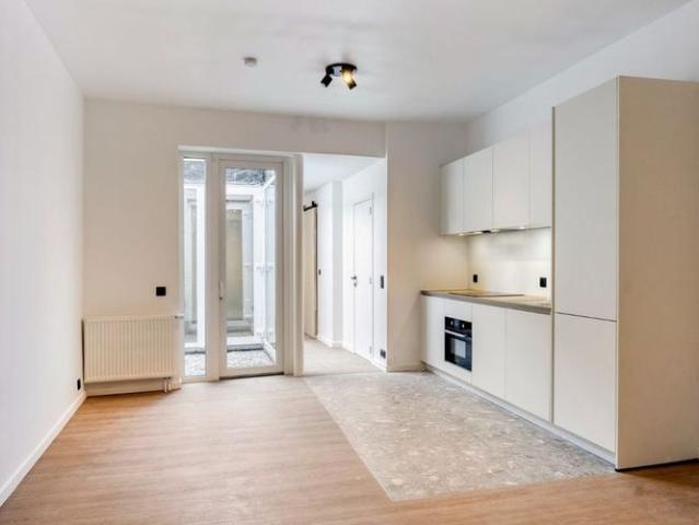 Gelijkvloers app. te huur in Leuven voor € 995 met 1 slaapkamer