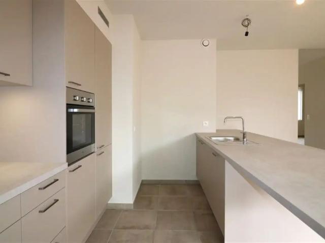 Gelijkvloers appartement, 2 slpk autostaanplaats