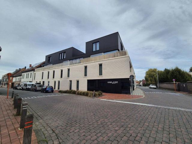 Gelijkvloers appartement met eigen tuin