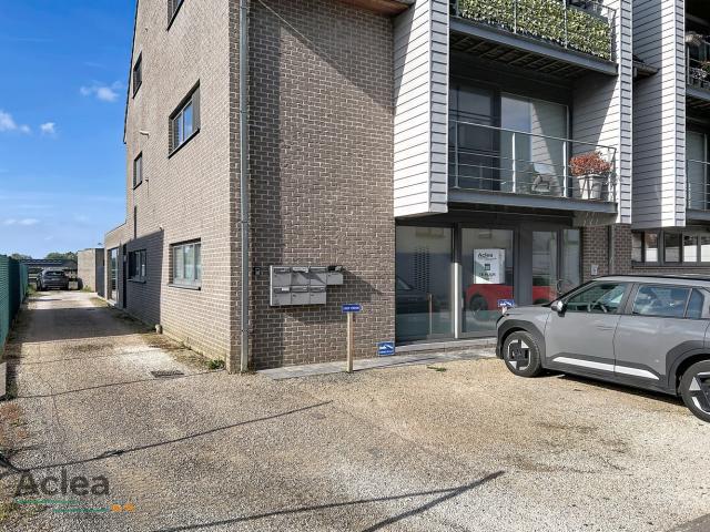 Gelijkvloers appartement met garage