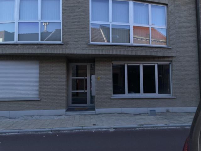Gelijkvloers appartement met klein tuintje