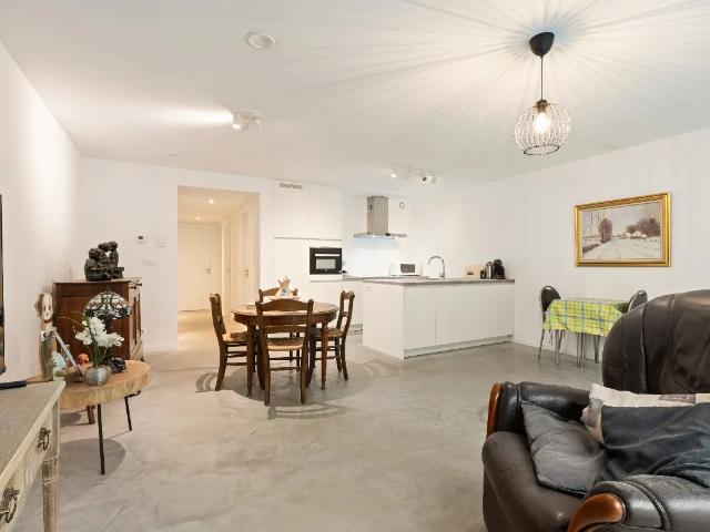 Gelijkvloers appartement met privétuin en autostaanplaats