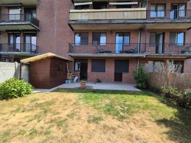 Gelijkvloers appartement met tuin