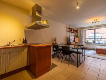 Gelijkvloers appartement met twee slaapkamers en autostaanplaats