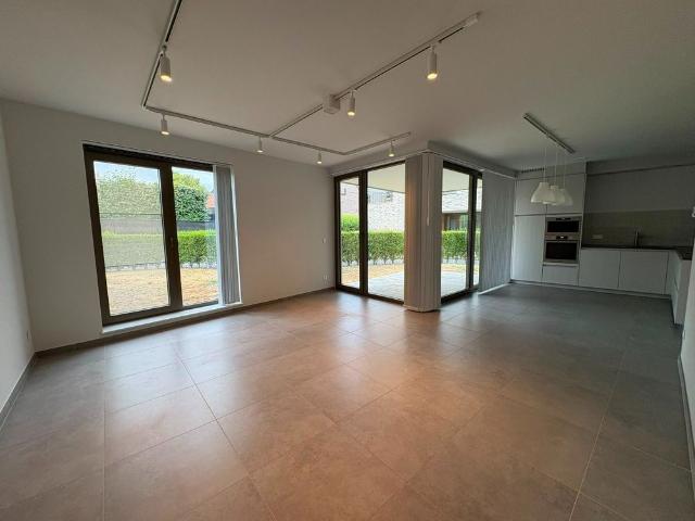 Gelijkvloers appartement met terras en tuin in centrum Alken