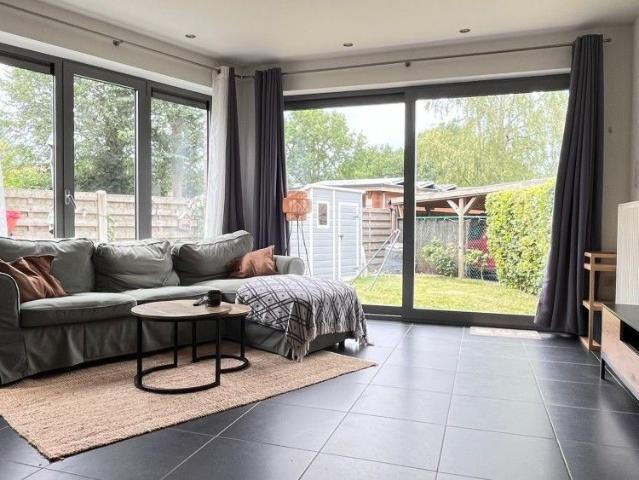 Gelijkvloers appartement met terras en tuin