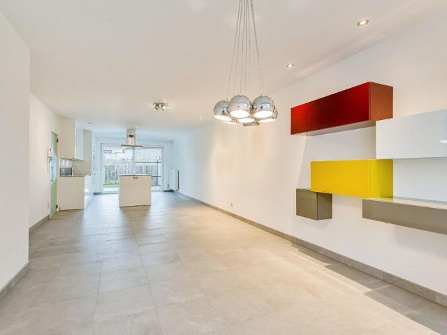 Gelijkvloers appartement met zuidgericht terras en tuin