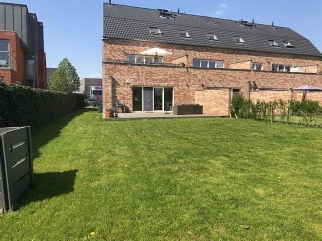 Gelijkvloers appartement met zuidgericht terras en tuin
