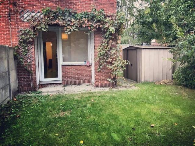 Gelijkvloers appartement met 1 slaapkamer, tuin en garage