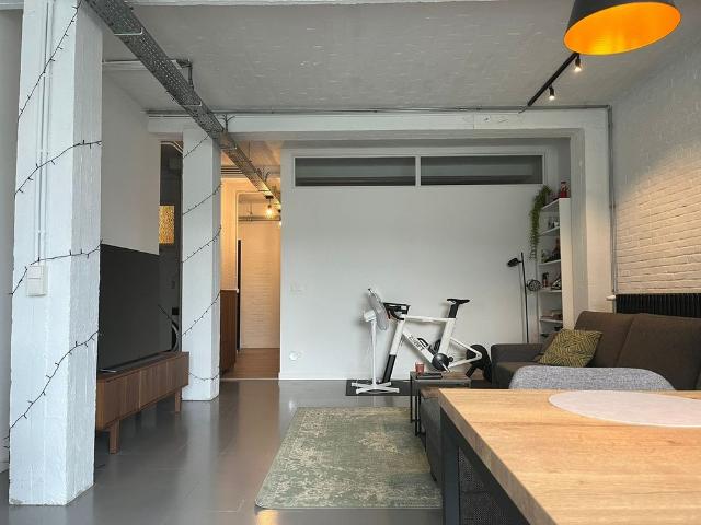 Gelijkvloers appartement met 1 slaapkamer, tuin en staanplaats nabij centrum Mol