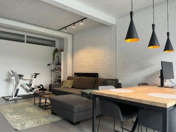 Gelijkvloers appartement met 1 slaapkamer, tuin en staanplaats nabij centrum Mol