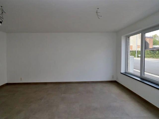 Gelijkvloers appartement met 1 slaapkamer & tuin