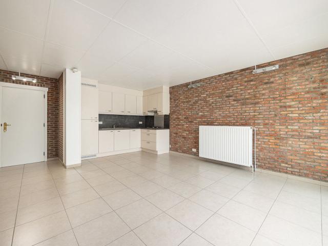 Gelijkvloers appartement met 1 slpk en tuin in Kessel Dorp