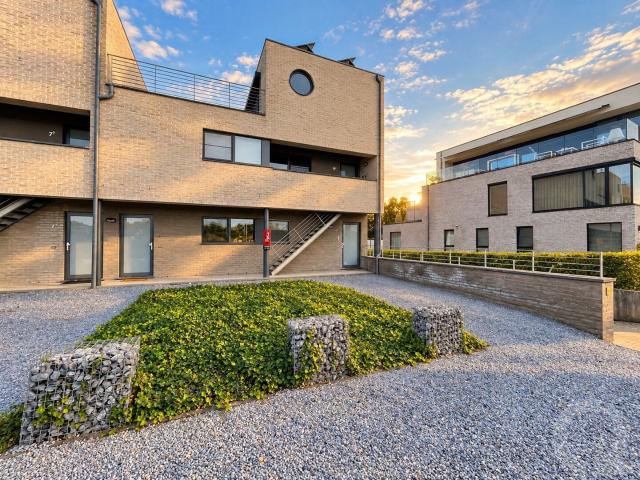Gelijkvloers appartement met 1slpk, zeer ruim terras & tuin
