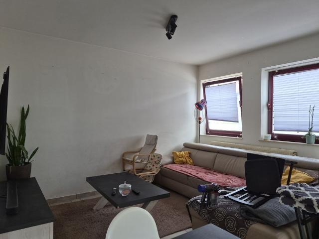 Gelijkvloers appartement met 2 slaapkamers en carport