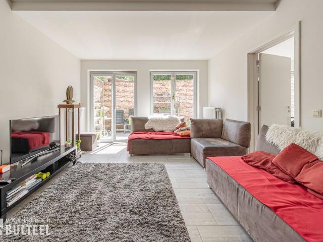Gelijkvloers appartement met 2 slaapkamers en een terras
