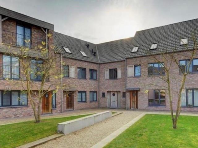 Gelijkvloers appartement met 2 slaapkamers en tuin