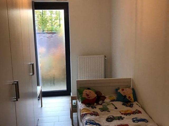 Gelijkvloers appartement met 2 slaapkamers en tuin