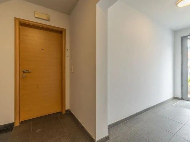 Gelijkvloers appartement met 2 slpk terras en garagebox