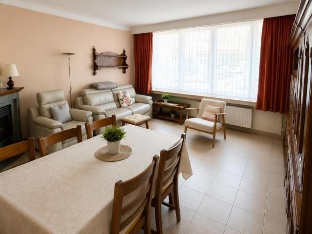 Gelijkvloers appartement met 2 slpk en tuin