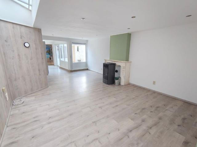 Gelijkvloers één slaapkamer huis met garage