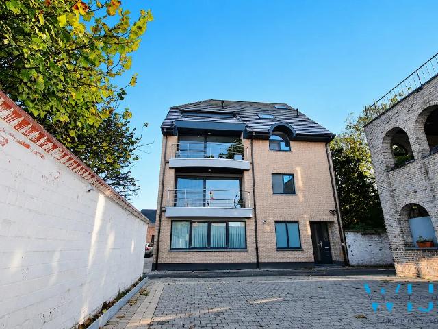 Gelijkvloers tweeslaapkamer appartement in hartje Ertvelde!
