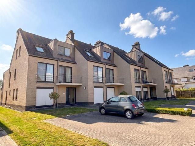 Gelijkvloersappartement met 2 slaapkamers en tuin