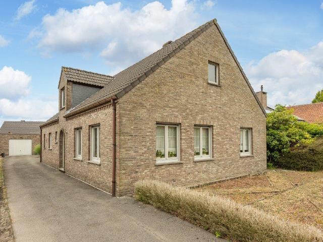 Gelijkvloerse woning met 3 slaapkamers met tuin en garage