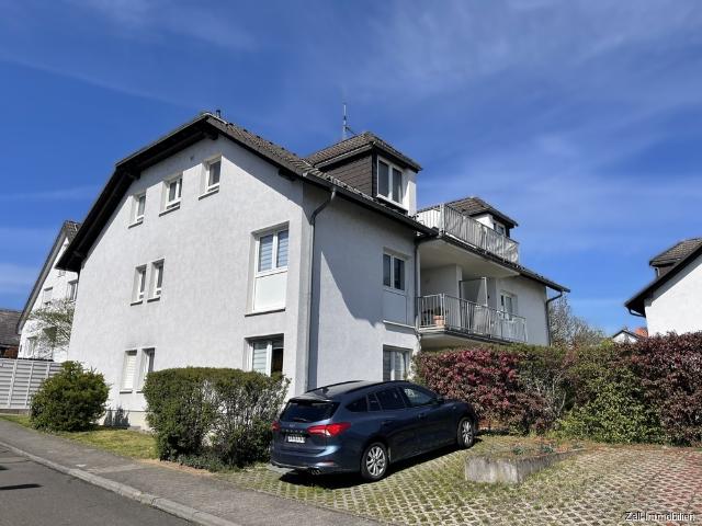 Gepflegte 3 Zimmer Eigentumswohnung mit Südterrasse und TG Stellplatz