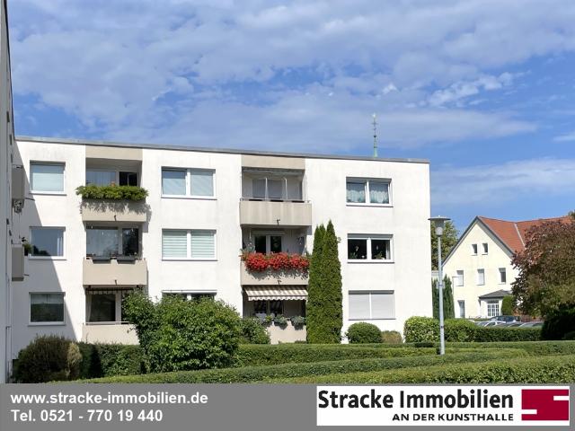 Gepflegte 3 Zimmer Wohnung mit Sonnenbalkon, Grünblick und eigenem Tiefgaragenplatz