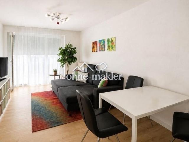 Gepflegte 2 Zimmer Wohnung mit Südwest Terrasse, separatem Aufgang und Tiefgaragenstellplatz