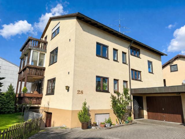Gepflegte 4,5 Zimmerwohnung mit off. Kamin, Wintergarten und gem. Gartenbereich