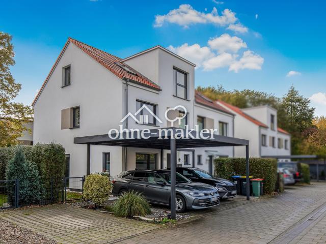 Gepflegte Doppelhaushälfte mit Südgarten, überdachter Terrasse & Doppel Carport – provisionsfrei