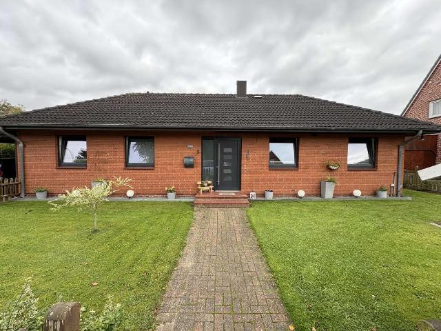 Gepflegter Bungalow mit Wintergarten, Garage und liebevoll gestaltetem Garten