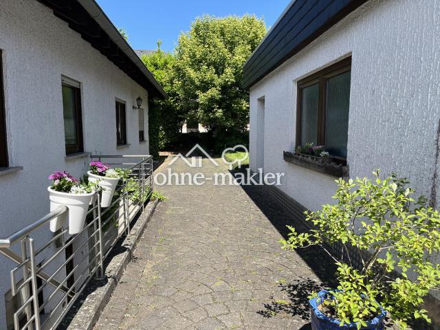 Gepflegter Bungalow komplett unterkellert mit großer Terrasse und Garten zu verkaufen