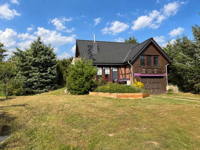 gepflegtes offen gestaltetes EFH mit 3 Zimmern, Kamin, 3 x Terrasse, Garage, EBK, Sichtbalken
