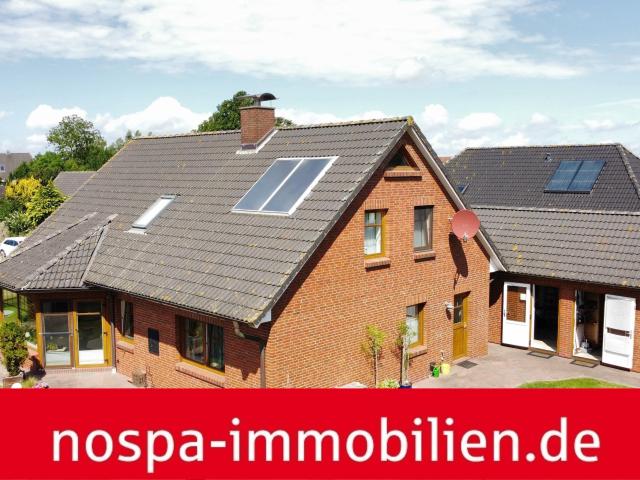 Gepflegtes Einfamilienhaus mit Garage und Terrasse auf der Insel an Land
