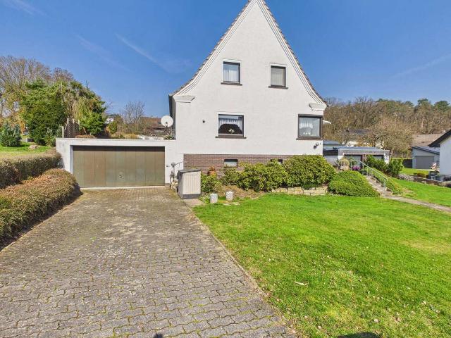Gepflegtes Einfamilienhaus mit tollem Grundstück und Wintergarten in Obersuhl zu verkaufen