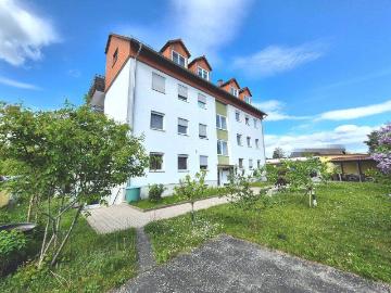 Gepflegtes 8 Familienhaus mit Garagenhof auf großzügigem Grundstück und Entwicklungspotenzial