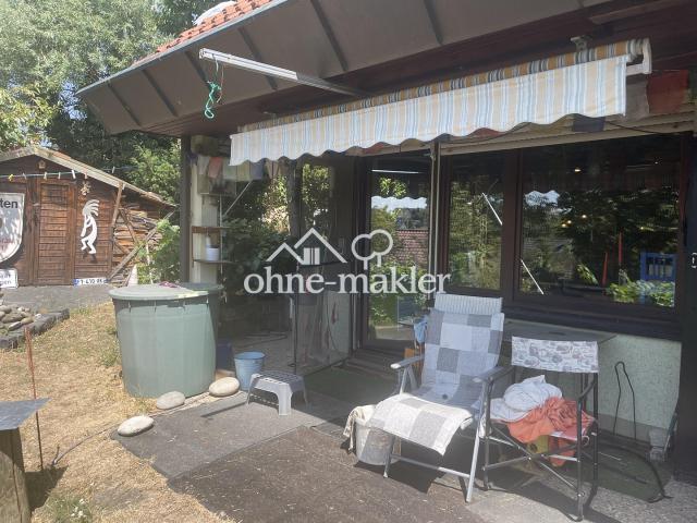 Geräumige 3 Zimmer Wohnung mit eigenem Garten und Garage