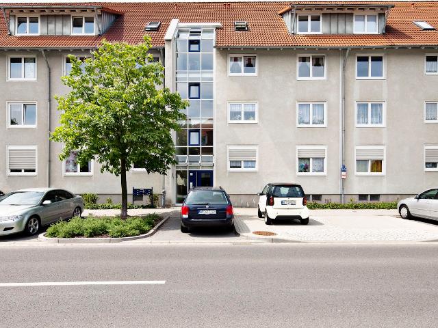 Geräumige 3 Zimmer Wohnung mit eigener Terrasse und Gartenanteil zur Nutzung